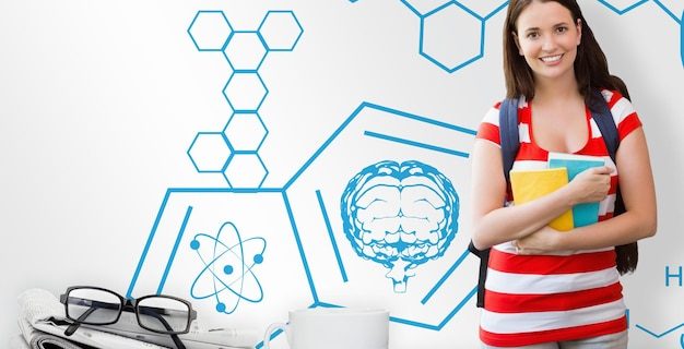 Image composite d'étudiant souriant à la caméra dans la bibliothèque